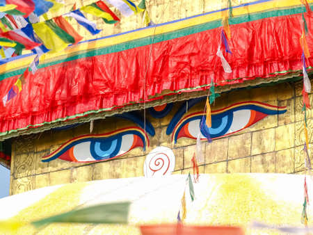 Buddha's eyes on the base of spire of Boudhanath Stupa close-up, Kathmandu, Nepalの写真素材