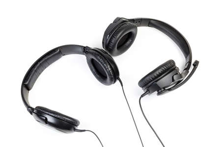 Top view of the black wired high-fidelity headset and ear speakers with full size headphones lose-up...