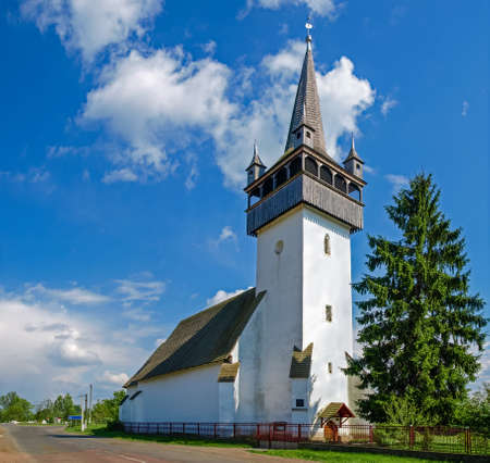 Former gothic stone defensive Reformed church of 14th-19th centuries with bell tower, now Roman catholic Church of the Heart of Jesus in village Bene, Zakarpattia Oblast, Ukraineの写真素材