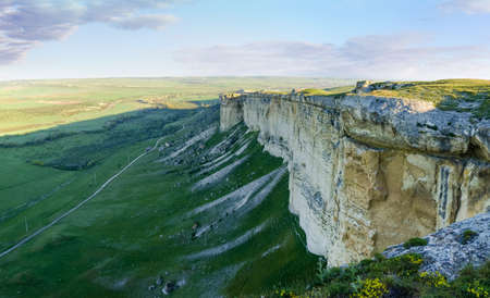 View of valley from the steep limestone edge of plateau in the morning, panoramic view from a mount...