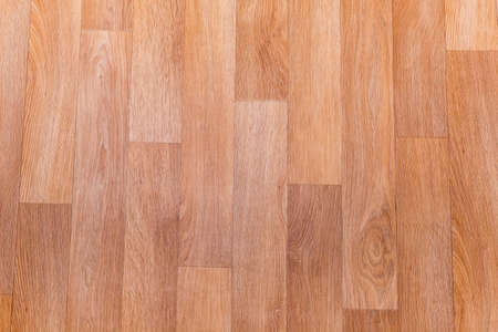 Top view of new linoleum flooring with embossed imitation of wooden parquet pattern, fragment, background
の写真素材