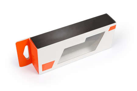 Empty small rectangular cardboard accessory packing box with plastic transparent window on a white backgroundの写真素材