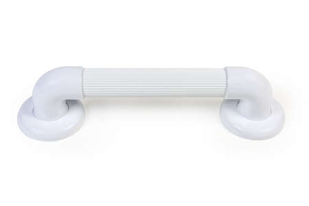 Horizontal white plastic grab bar with grooved handle on a white surfaceの写真素材