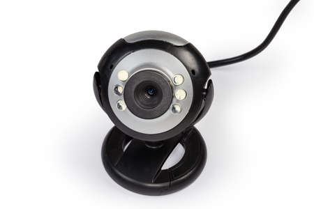 Wired webcam with LED backlight and clip for fastening, close-up on a white background