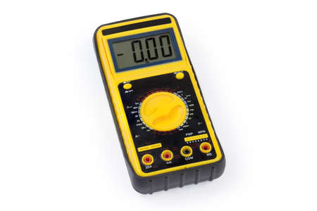 Modern portable handheld universal digital multimeter with LCD display in protective rubber cover on a white backgroundの写真素材