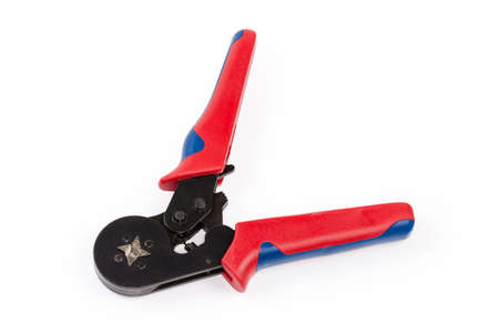 Hand crimp tool for crimping of the round electric wire terminals different sizes on a white backgroundの写真素材