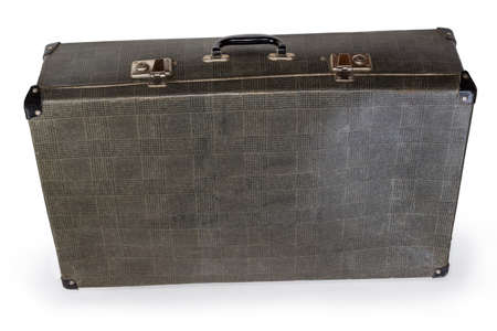 Closed old fashioned shabby hardshell rectangular-shaped suitcase made with gray leatherette on a...