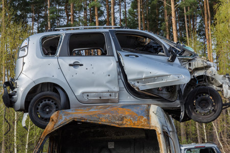 IRPIN, UKRAINE - Apr.27,2022: Side part of the civil car which was shot up by Russian soldiers...