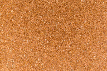 Freshly harvested threshed ripe grain of the winter wheat not completely cleared of chaff, backgroundの写真素材