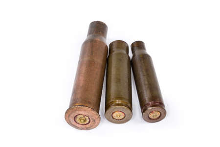 Spent cartridges from assault rifles or submachine guns different caliber on a white background