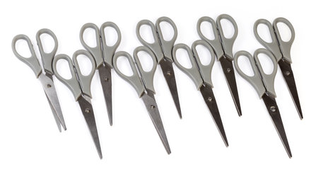 Several stainless steel universal scissors for cutting paper, cardboard and other various thin...