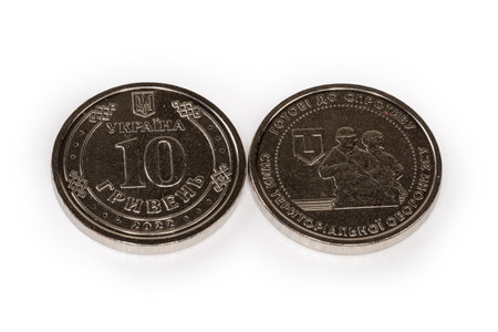 Circulating commemorative coin Territorial Defense Forces of the Armed Forces of Ukraine denomination ten Ukrainian hryvnia 2022, obverse and reverse close-up on a white backgroundの素材 [FY310197258331]