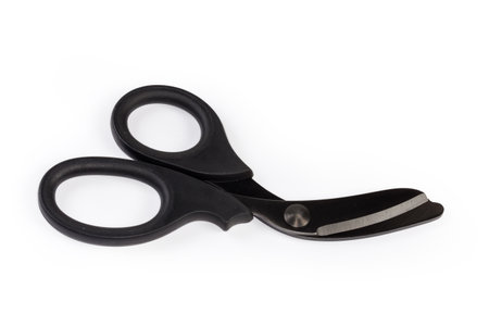 Trauma shears for cutting seat belts and clothing of the injured people during rescue operations, view on a white backgroundの写真素材