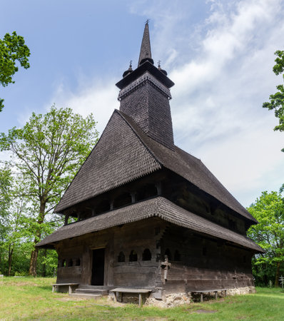 Gothic two-log wooden Church of the St. Nicholas the Wonderworker of 18th century in the Danylovo village, Ukraineの写真素材