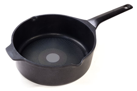 Modern empty deep frying pan made of cast aluminum with titanium non-stick coating and opposite helper handle on a white backgroundの写真素材