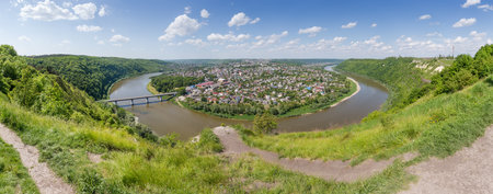 Scenic river loop of the Dniester river, flowing in the canyon valley near the town of Zalischyky, Ukraine. Panoramic view in summer day.の写真素材