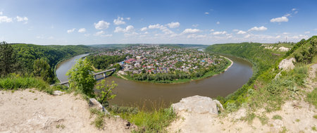 Scenic river loop of the Dniester river, flowing in the canyon valley near the town of Zalischyky, Ukraine. Panoramic view in summer day.の写真素材