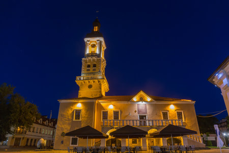 Old town hall 14-16th centuries, former House of the Polish Magistrate in spring night in Kamianets-Podilskyi city, Ukraineの写真素材