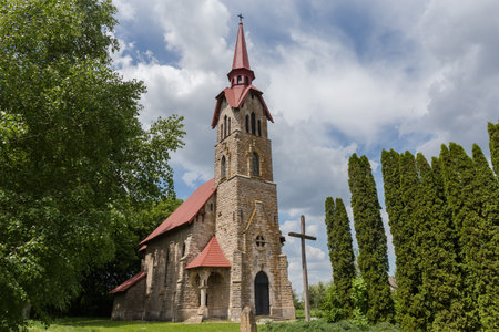 Stone neo-gothic catholic church of St. Anthony of Padua of the end of the 19th century in Losyach village, Ukraineの写真素材