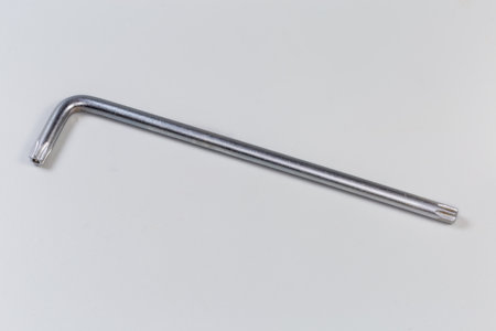 L-key with 6-point star-shaped tips with holes, also known as hexalobular internalon as official...