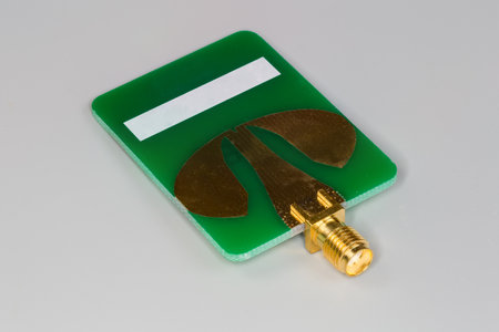 Small-sized flat antenna of high-frequency mobile electronic unit made on the printed circuit board...