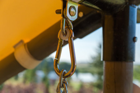 Metal suspension unit consisting of bracket with bolt, hook, suspension carabiner and chain for...