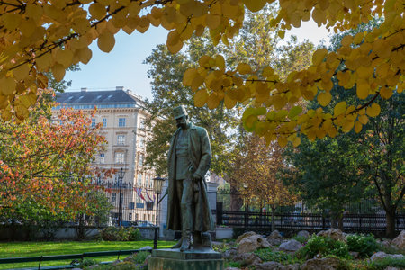 Monument to Kaiser Franz Joseph I, created in the beginning of 19th century, now located in the City garden as a bronze copy of stone original, Vienna, Austria. View in autumn sunny dayの写真素材
