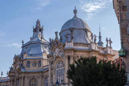Building Museum of Hungarian Agriculture in the Vajdahunyad Castle of early 20th century in Budapest, view of upper part of building and rooftop at autumn sunny dayの写真素材
