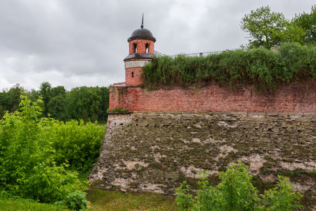 Outer corner of the bastion with limestone and brick wall and small round tower atop, known as...