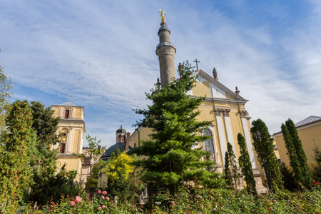Main western facade and bell tower of the Cathedral of the Holy Apostles Peter and Paul 15-17th centuries in historic Old Town in Kamianets-Podilskyi at autumn sunny day, Ukraineの写真素材