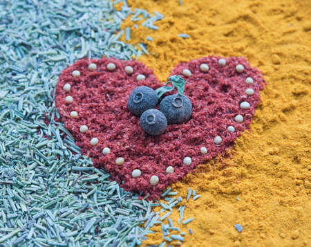 Color background with heart from spices の写真素材