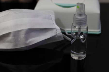 White Mask and Alcohol Disinfection Spray and Disinfection Sheetの写真素材