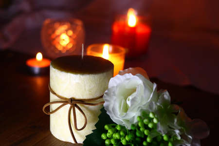 White flowers and candlesの写真素材