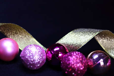 Pink and red and golden colorful decoration background texture (black background)の写真素材