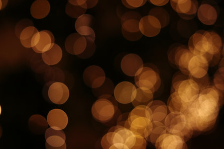 Illumination of the city at night Golden bokeh background textureの写真素材
