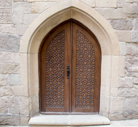 wooden traditional old door and wall. close upの写真素材
