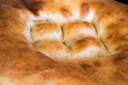 Traditional Asian bread. Delicious baked crispy flat breads, a bread cooked in a tandoor, clay oven.の写真素材