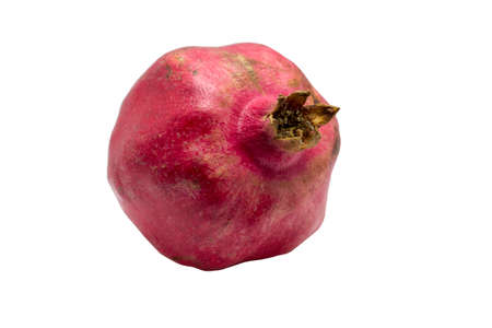 Whole pomegranate isolated on white background