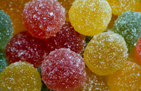 Colorful marmalade and sugar background closeup. Sweet dessertの写真素材