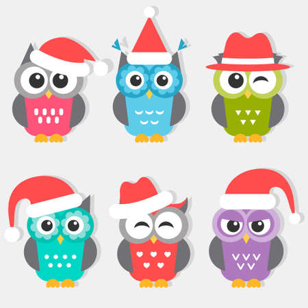 Icons of cute owls with Christmas hatsのイラスト素材