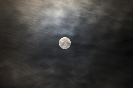 A supermoon on a foggy night