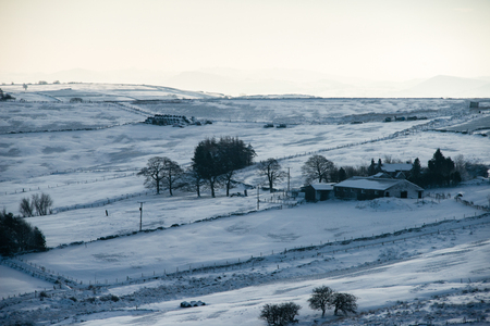 A veiw of the English countryside covered with snowの写真素材