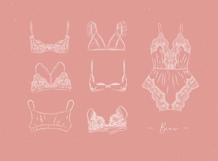 Lace sexy bras collection drawn in graphic style on peach color backgroundのイラスト素材