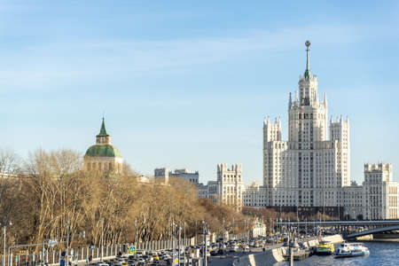 Moscow, Russia - November 13, 2018: View on Kotelnicheskaya Embankment Building, Moscow River, and cars in a traffic jam on Moskvoretskaya Embankment from the observation deck at Zaryadye Parkのeditorial素材