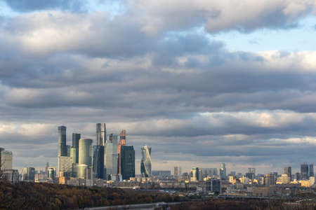 Moscow, Russia - October 22, 2017: View on Moscow City downtown district with heavy clouds in the sky during duskのeditorial素材