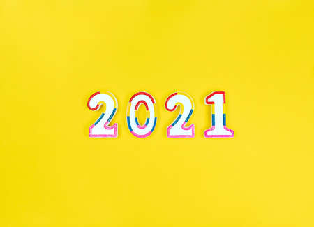 New year 2021 figures on a yellow background.の写真素材