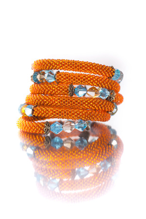 Ornaments from beads colorful bright on a white backgroundの写真素材