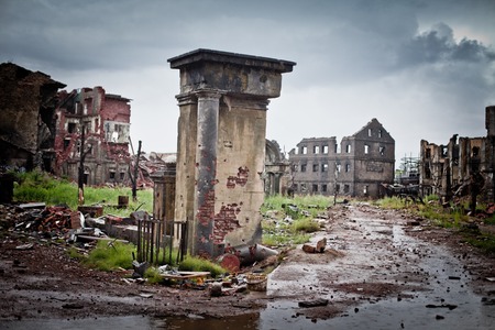 abandoned houses and ruined city wet and muddyの写真素材