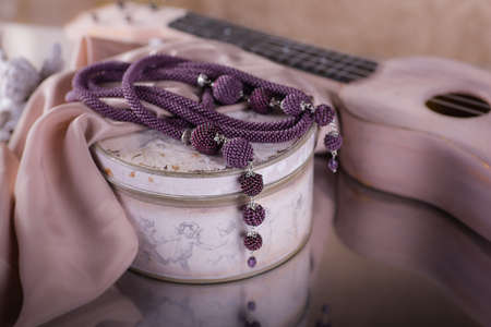 woman beautiful decoration of beads bright colorの写真素材