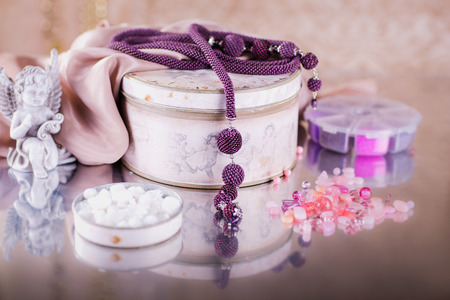 woman beautiful decoration of beads bright colorの写真素材